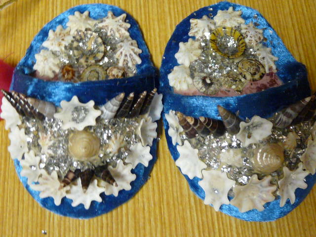 Shell art baby shoes by La Perouse artist